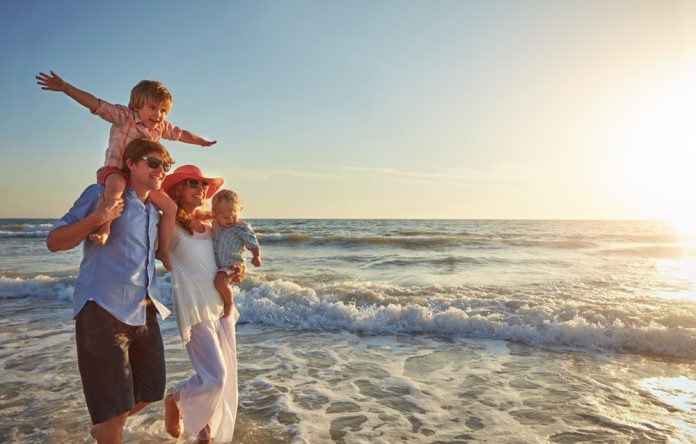 Family walking on the beach