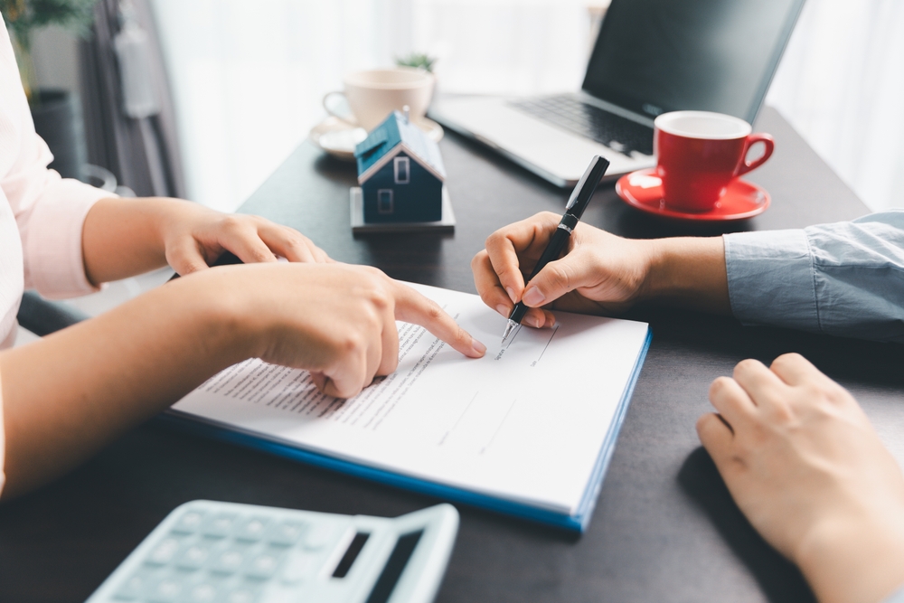 filling out mortgage paperwork