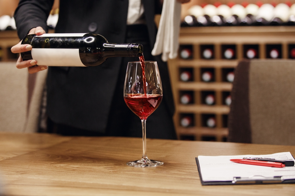 wine being poured in a glass